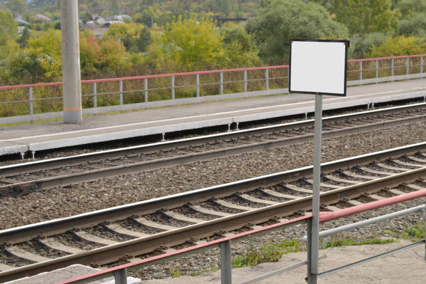 istock The tracks and passenger platform at a small train station. 1050523756