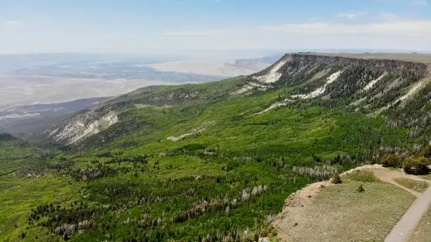 This is an aerial shot, taken by drone in the vicinity of the Land's End Observatory. The Grand Mesa is the World's largest flat-topped mountain. The view is breathtaking!
