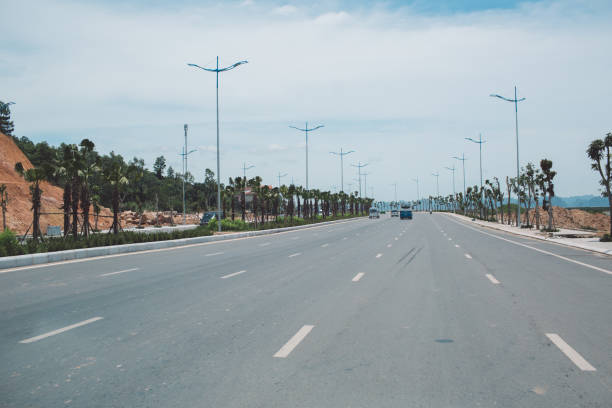 istock Street Lights On Roadside Against Sky 1050548158