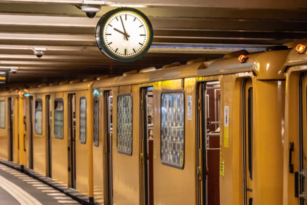 istock Opened Doors Of Train At Railroad Station Platform 1050548456