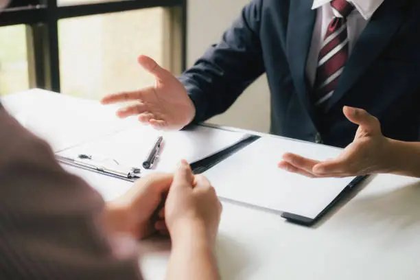 Photo of Lawyer are providing legal advice to clients.