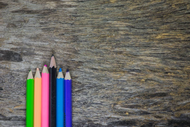 istock Close up of stack colour pencils on wooden background 1050569602