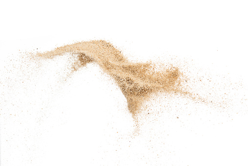 Sand flying explosion isolated on white background ,throwing freeze stop motion object design