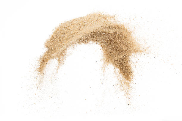 istock Sand flying explosion isolated on white background ,throwing freeze stop motion object design 1050576868