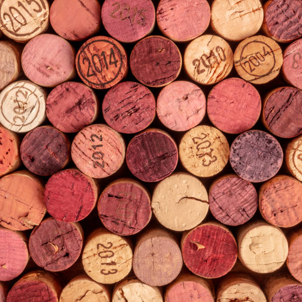 istock Wine corks background, overhead photo of red and white wine corks 1050578172