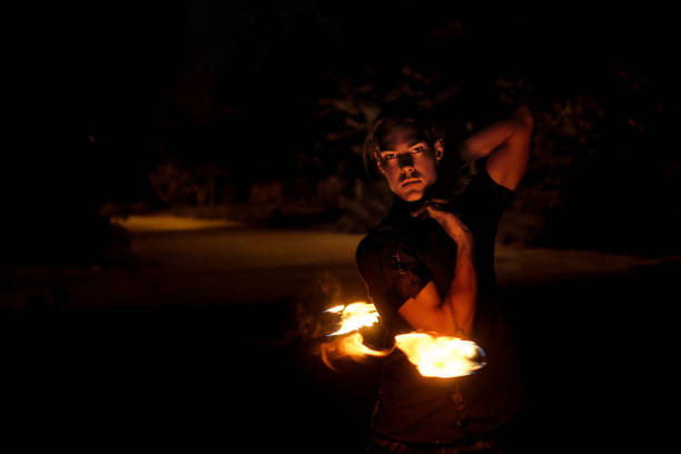 istock Fire show. Dance with Poi. 1050582838
