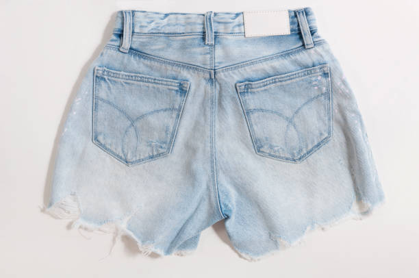 istock stylish female light blue color shorts back view 1050598328