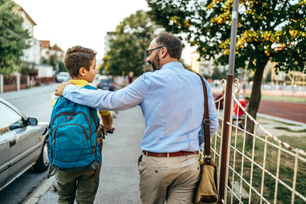 istock Dad's walking him to school today 1050616176