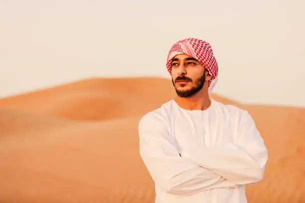 Portrait, Close up, Desert, Arabia, Emirati, Middle Eastern Ethnicity - Portrait of an Arab man.