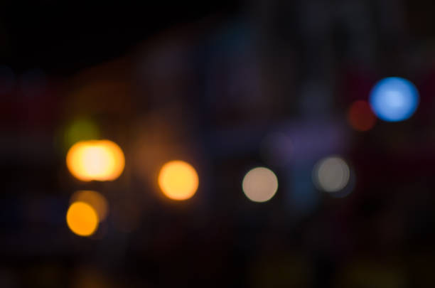 istock Abstract city night defocused light, blur bokeh, colorful & dark background. Shiny, backdrop, bubble & dreamy. 1050631186