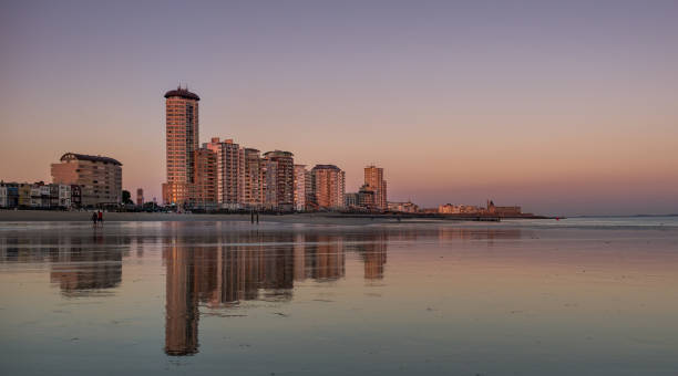 istock Skyline of Vlissingen reflected from beach 1050633738