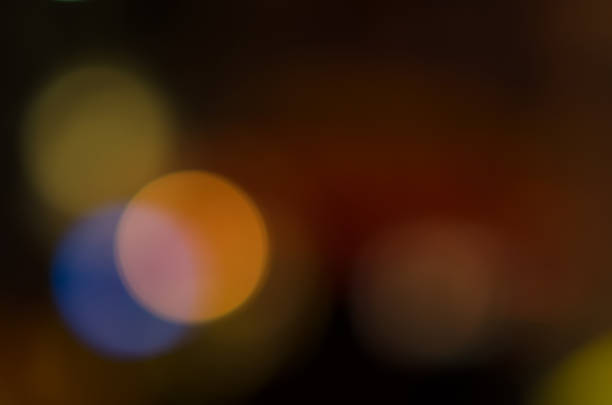 istock Abstract city night defocused light, blur bokeh, colorful & dark background. Street, pattern, backdrop & urban. 1050633834