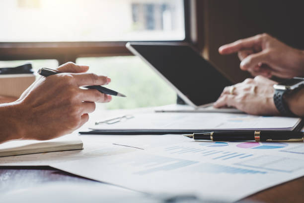 istock Teamwork process, Business team are meeting and discussing marketing plan strategy report analyzing financial at business document 1050643460