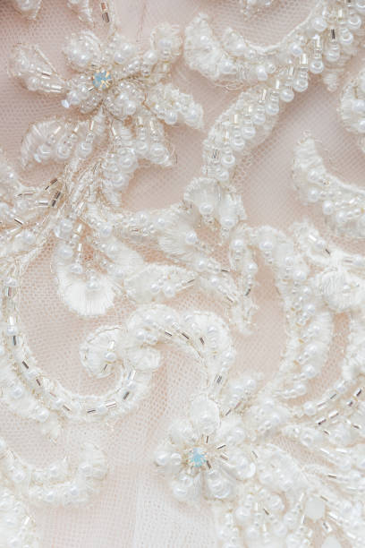 istock Beadwork details of a wedding dress 1050643626