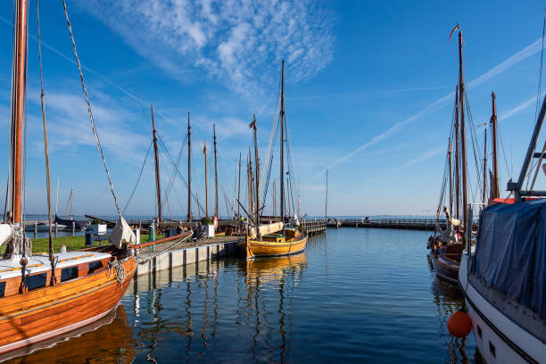 istock Port with sailing ships in Dierhagen, Germany 1050653964