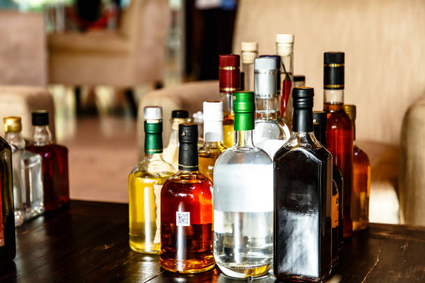 istock Many different bottles of alcoholic beverages are on the table. 1050657174
