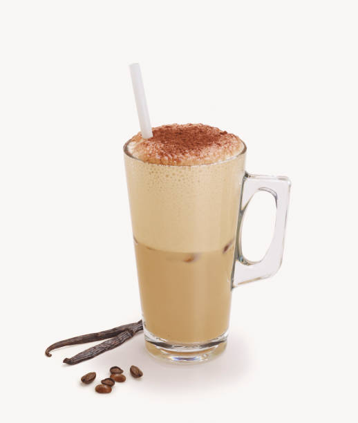 Glass coffee cup with vanilla and coffee beans