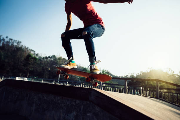istock Skateboarder skateboarding at skatepark 1050679984