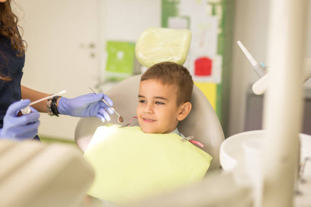istock Little boy at regular dental check-up 1050680000