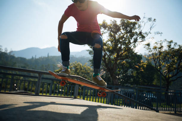 istock Skateboarder skateboarding at skatepark 1050682716