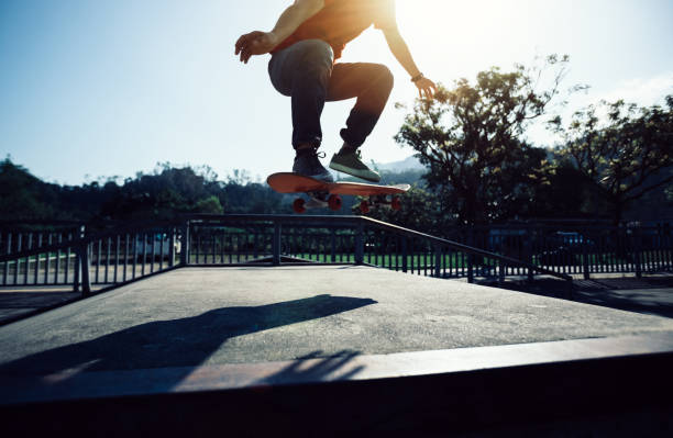 istock Skateboarder skateboarding at skatepark 1050686010