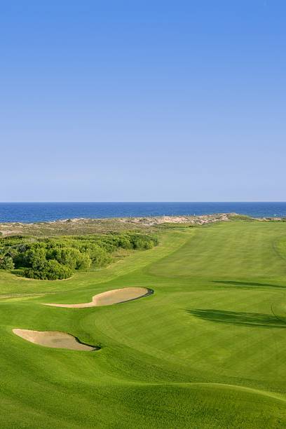 istock Golf course green grass near sea ocean 105069241