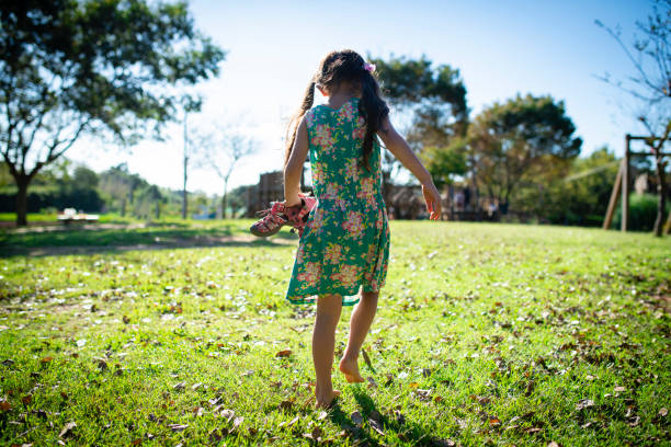 istock Girl playing barefoot 1050702474