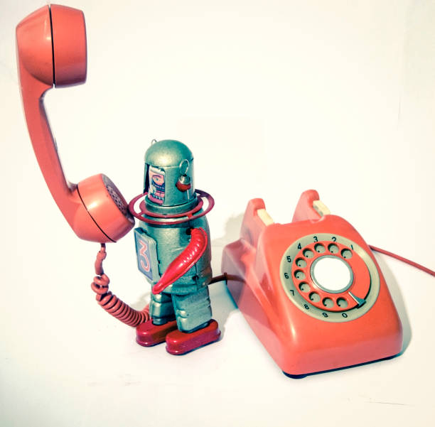 istock retro robot on an old phone robot calls 1050703164