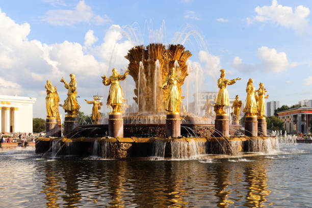 istock Summer fountain with gold sculptures. 1050709050