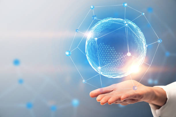 istock Woman hand holding Earth network hologram 1050712220
