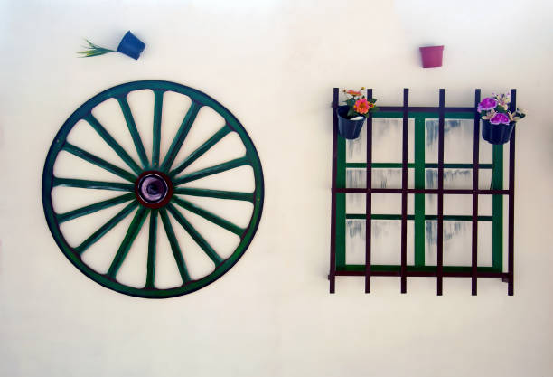 istock Sham cartwheel, window and flowers 1050713184