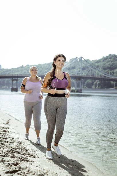 istock Happy active young women leading healthy lifestyle 1050715688