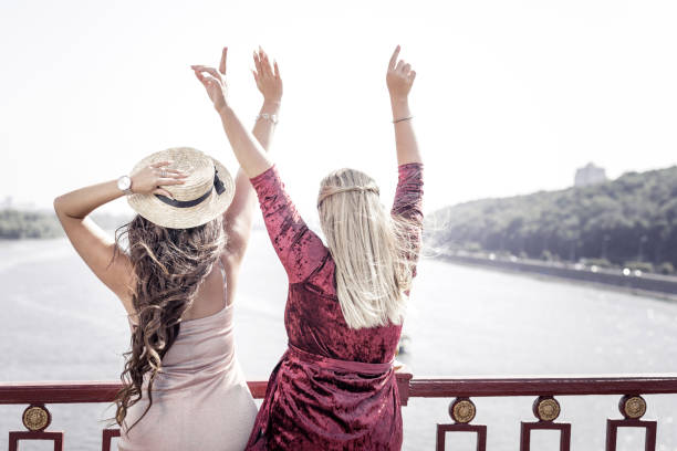 istock Delighted happy women looking at the river 1050715788