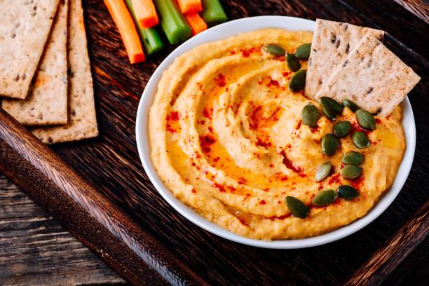 istock Homemade Savory Pumpkin Hummus . Thanksgiving Appetizer dip 1050716030
