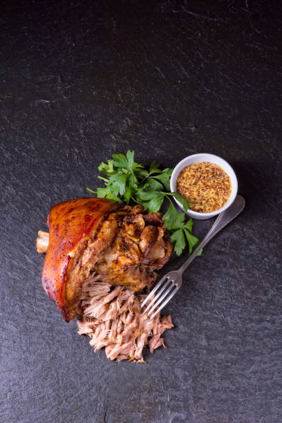 istock crispy fried Bavarian pork knuckle with soft meat 1050716266