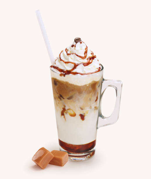 istock Glass coffee cup with chocolate and caramel candies. 1050716310