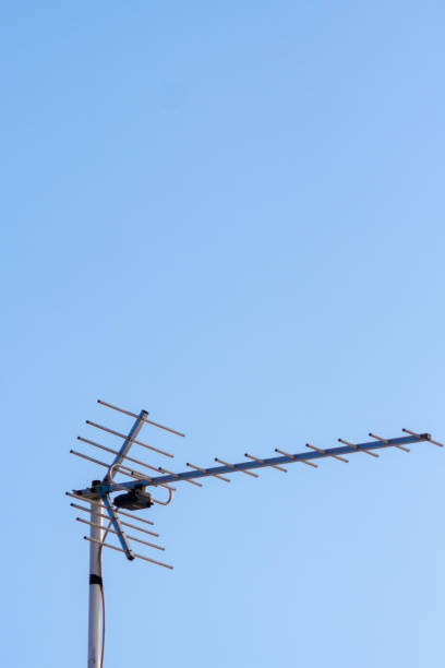 istock television antenna and blue sky background 1050716698