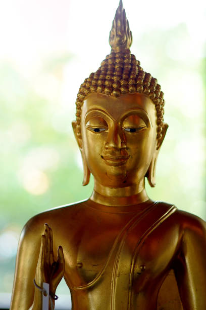 istock Golden buddha state in the art style as background 1050720174