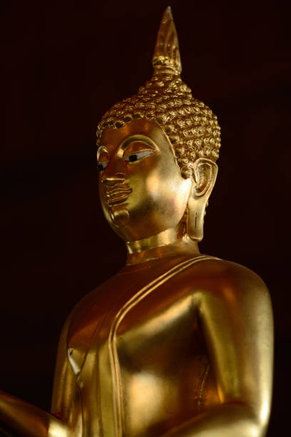 istock Golden buddha state in the art style as background 1050722408