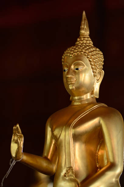 istock Golden buddha state in the art style as background 1050722546
