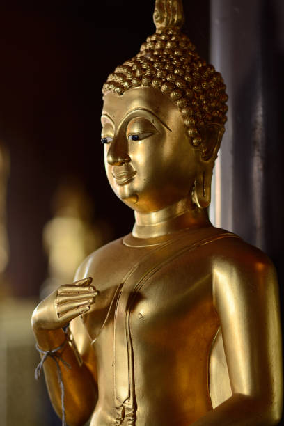 istock Golden buddha state in the art style as background 1050722582