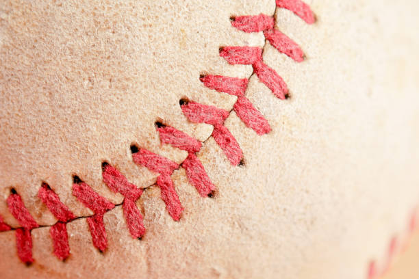 istock Sports Equipment old Baseball background texture 1050722826