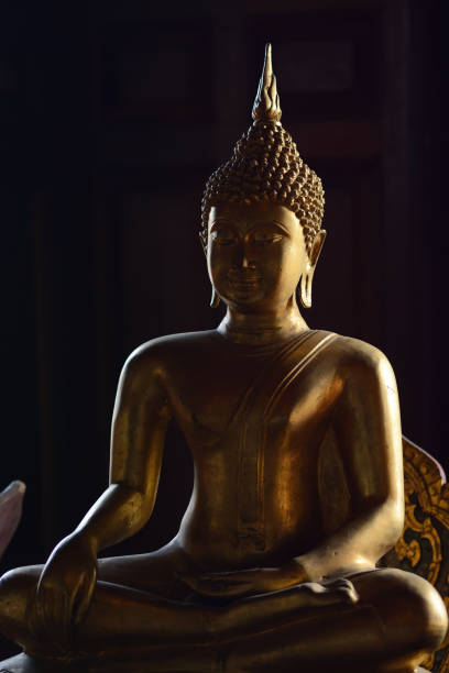 istock Golden buddha state in the art style as background 1050722990