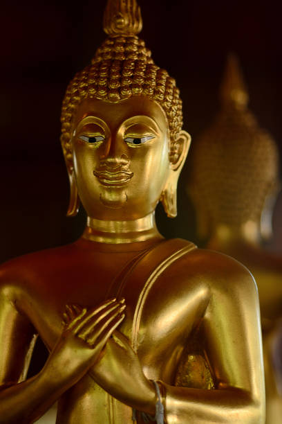 istock Golden buddha state in the art style as background 1050723010