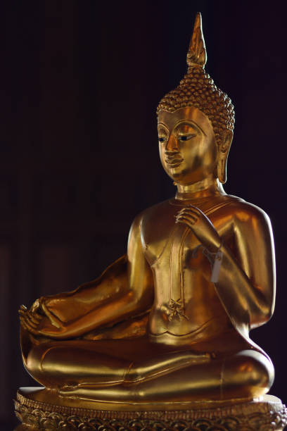 istock Golden buddha state in the art style as background 1050723162