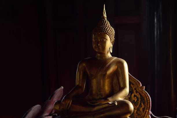 istock Golden buddha state in the art style as background 1050723202