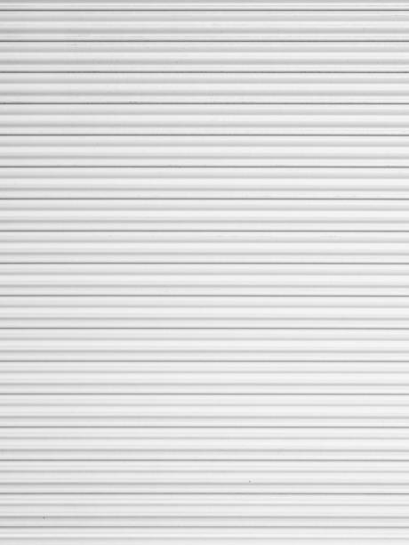 istock corrugated metal sheet,white Slide door ,roller shutter texture 1050729976