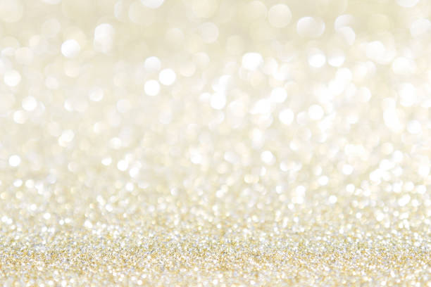 istock abstract background gold light bokeh christmas holiday 1050735950