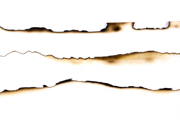 istock paper burned old grunge abstract background texture 1050736420