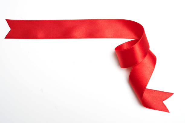 striscione nastro rosso su sfondo bianco - ribbon satin red isolated foto e immagini stock